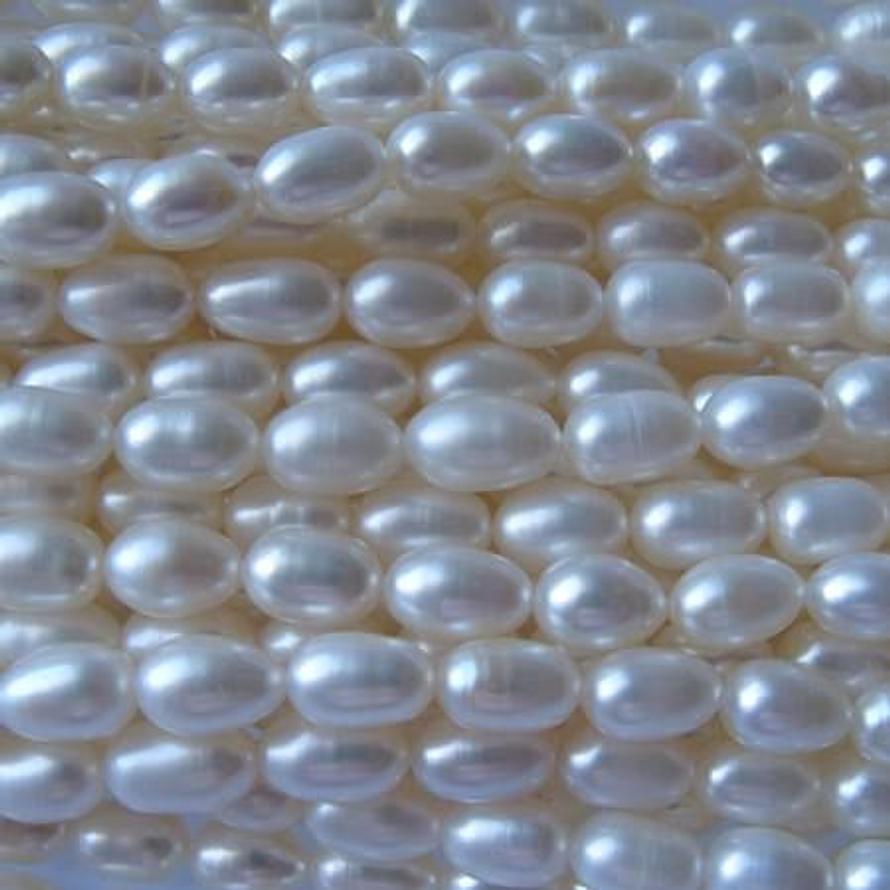 No.10 FRESHWATER PEARLS NATURAL WHITE RICE PEARLS 9x6mm LOOSE STRAND