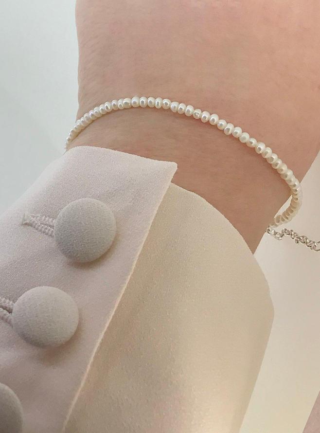 Coco Teenie Tiny Freshwater Seed Pearls in Bracelet